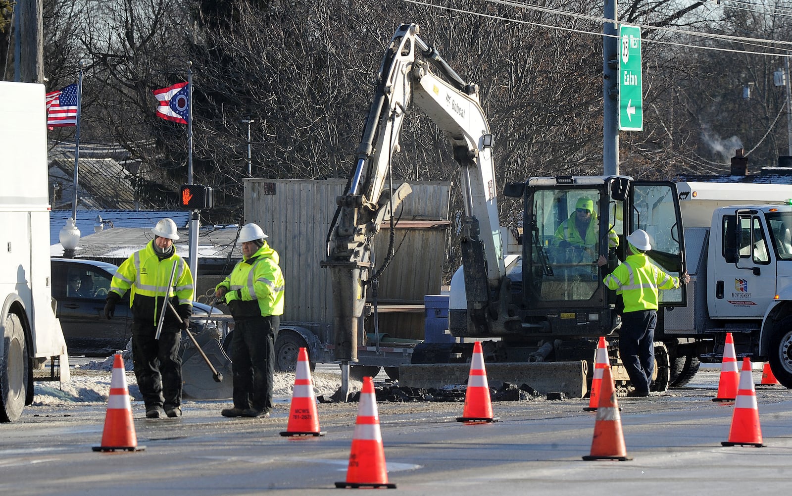 Montgomery County crews work to repair a water main break Wednesday, Jan 17, 2024 at West Third Street and state Route 49, near the edge of Trotwood and Jefferson Twp. and the Montgomery County Fairgrounds. MARSHALL GORBY\STAFF