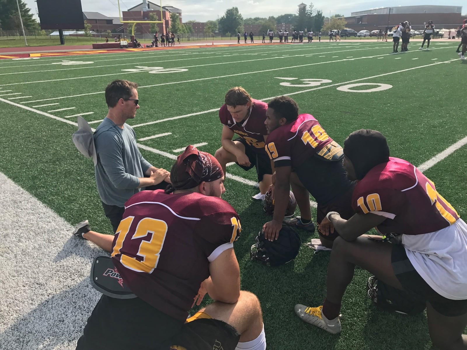 Central State offensive coordinator Buddy Blevins and Marauders quarterbacks Brandon Kyles (13), Alec Lewis (16), Chris Cotton (19) and Kendall Boney (10). Tom Archdeacon/CONTRIBUTED