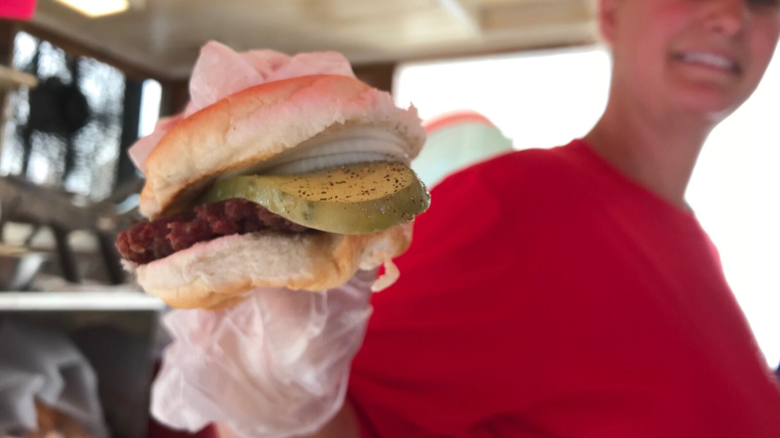 The Hamburger Wagon in Miamisburg offers a simply, crunch, bite-sized burger topped with a pickle.