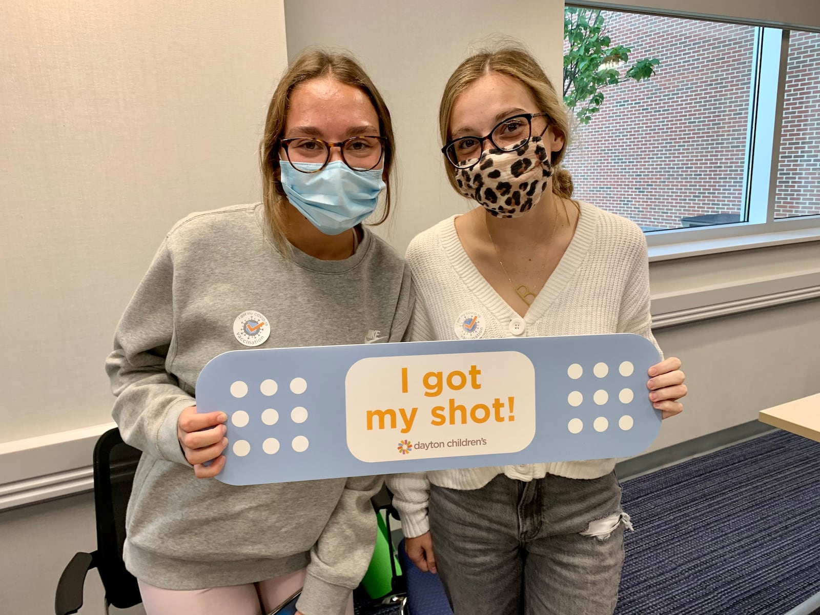 Kaylee Campbell and Brooklyn Cotton are 15-year-old best friends at Miamisburg High School. They got their coronavirus vaccines at Dayton Children's Hospital on Wednesday Sept. 1 so they hopefully will not miss homecoming again like they did last year.