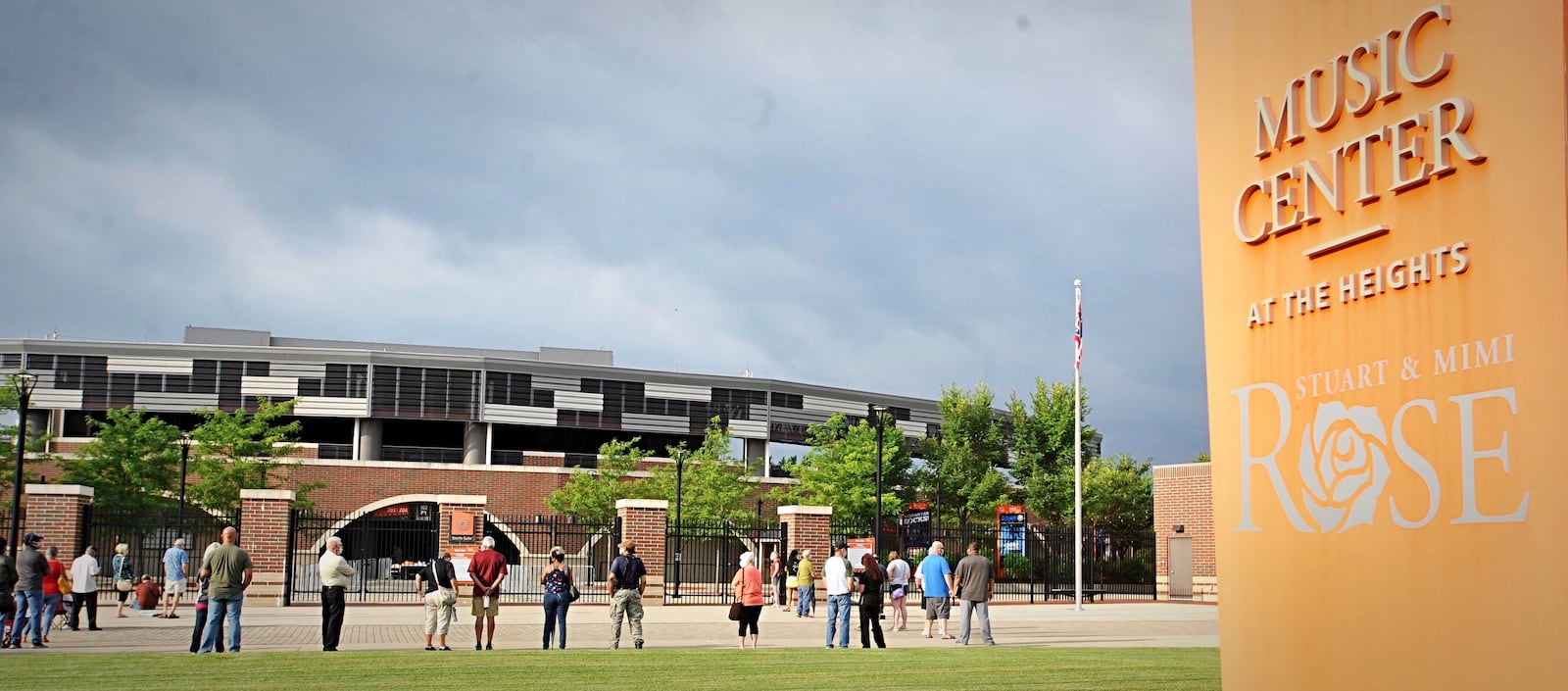 People were lined up outside of the Rose Music Center in Huber Heights Thursday morning ahead of free coronavirus testing. STAFF PHOTO / MARSHALL GORBY