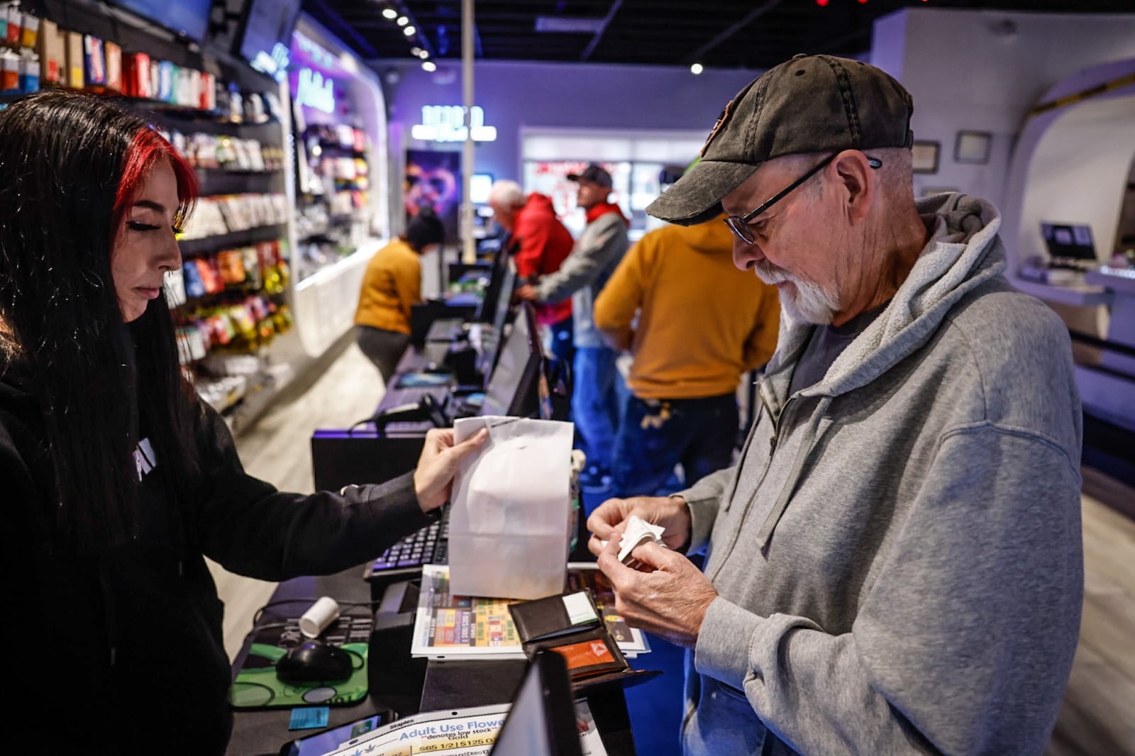 Alex Stephens is from a small town near Toledo, Ohio and crosses the Ohio border into Michigan to buy recreational marijuana at Amazing Budz. JIM NOELKER/STAFF