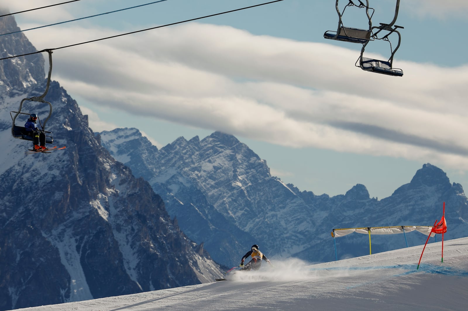 United States' Lindsey Vonn speeds down the course during an alpine ski, women's World Cup downhill training, in Cortina d'Ampezzo, Italy, Thursday, Jan. 16, 2025. (AP Photo/Alessandro Trovati)