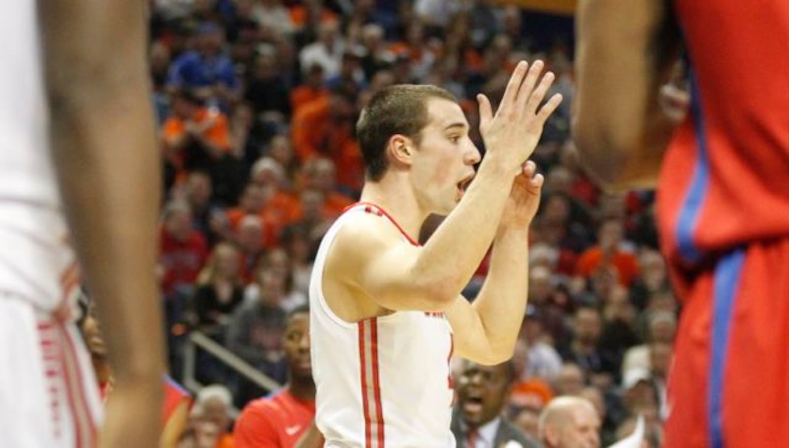 Ohio State's Aaron Craft, left, is surprised after being called for an intetional foul late in the second half in the second round of the NCAA tournament on Thursday, March 20, 2014, at the First Niagara Center in Buffalo, N.Y.