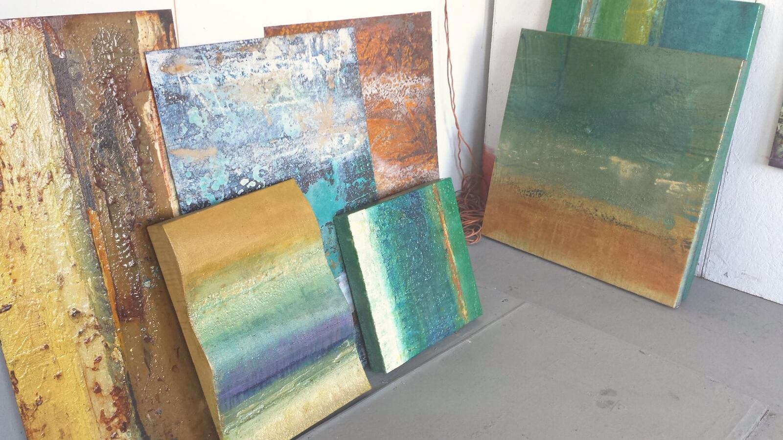 Girls on the Run of Dayton is holding a raffle to help fund programing scholarships. An original artwork by Mike Elsass, known for his colorful paintings on weathered steel, is among the items to bid on.  FILE PHOTO