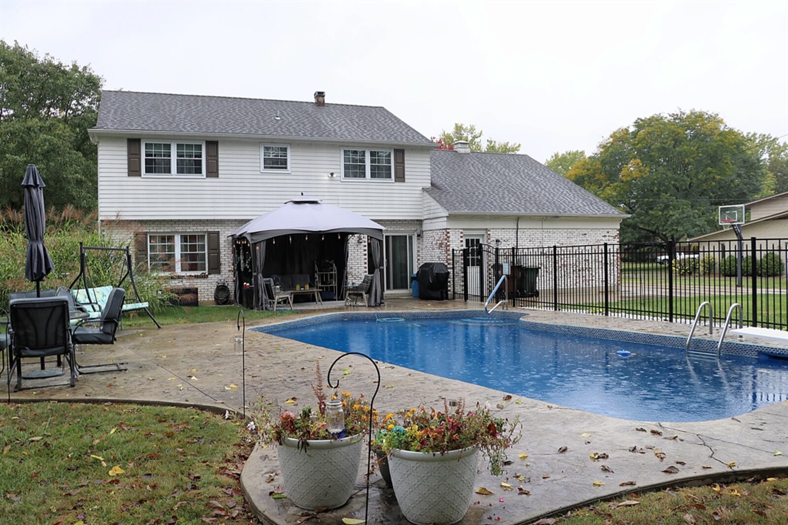 Two-story brick with in-ground swimming pool. KATHY TYLER/CONTRIBUTOR