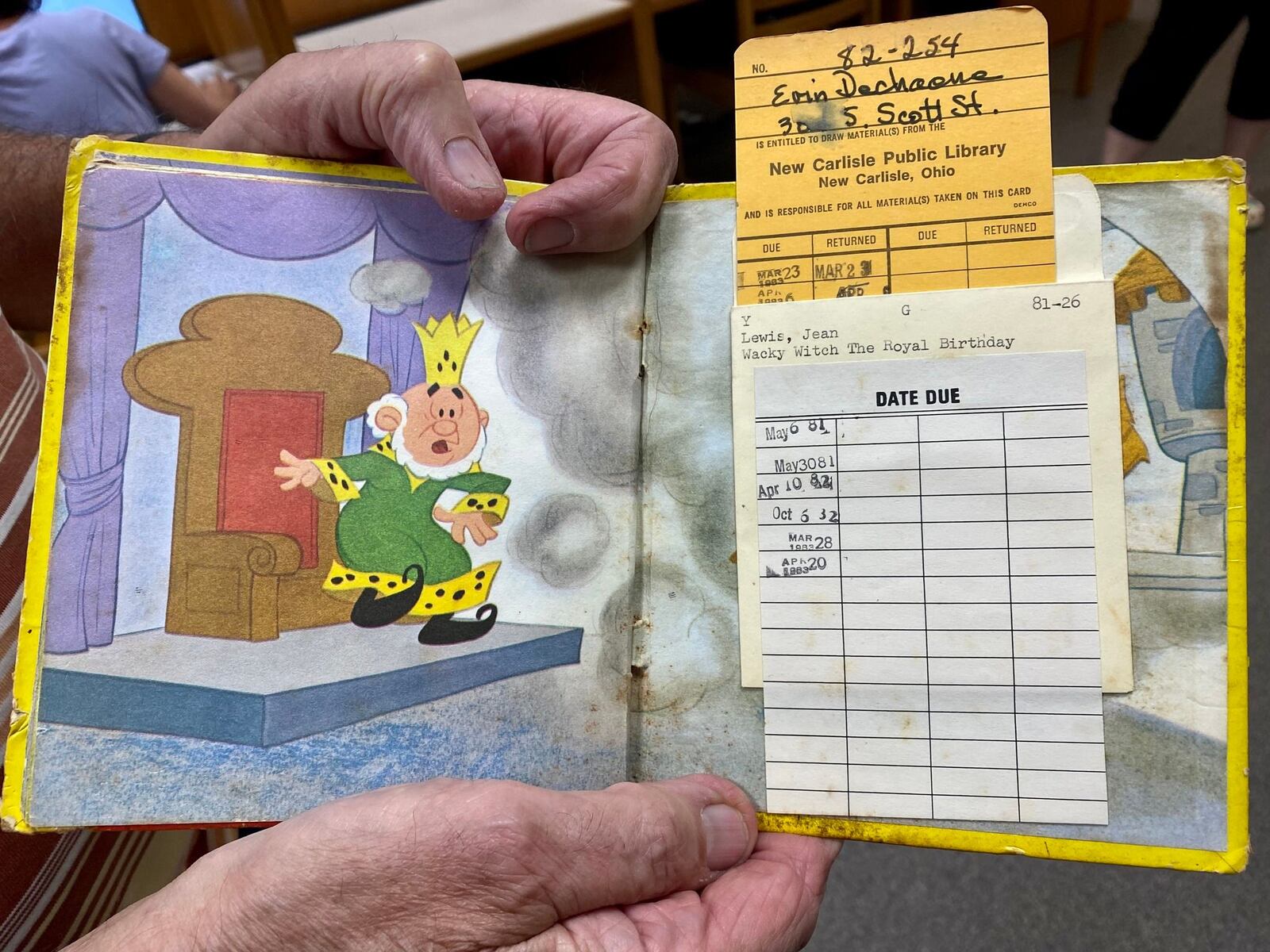 Erin Dechaene checked out a book in 1983 from the old New Carlisle library when he was eight years old, and his father Kendall recently found it and returned it to the library 40 years later. Contributed