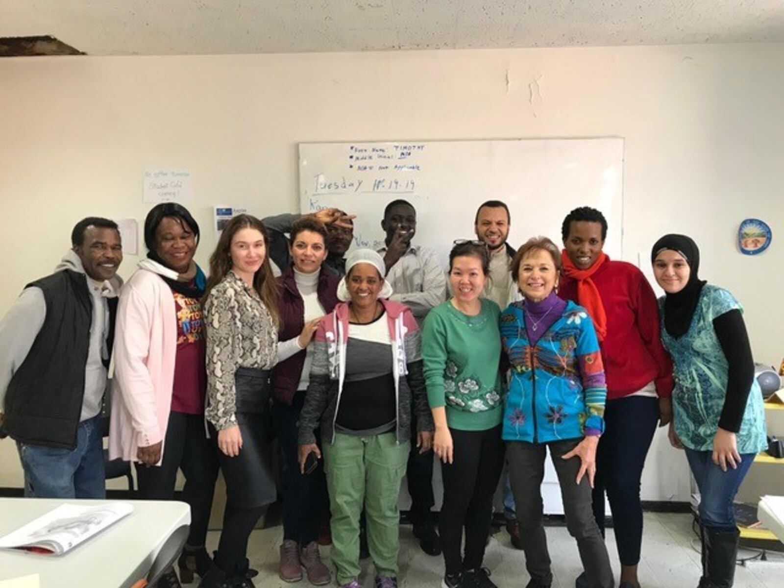 Karin Hirschkatz, a volunteer at St. John’s ESOL (English For Speakers of Other Languages) program, is pictured (third from right) with her students from around the world. CONTRIBUTED