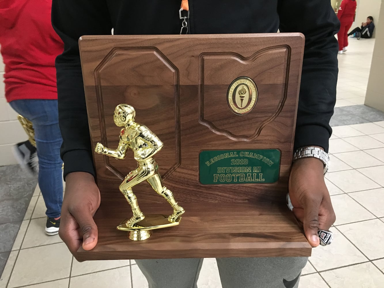 PHOTOS: Trotwood parents and fans welcome home football state champs at victory celebration