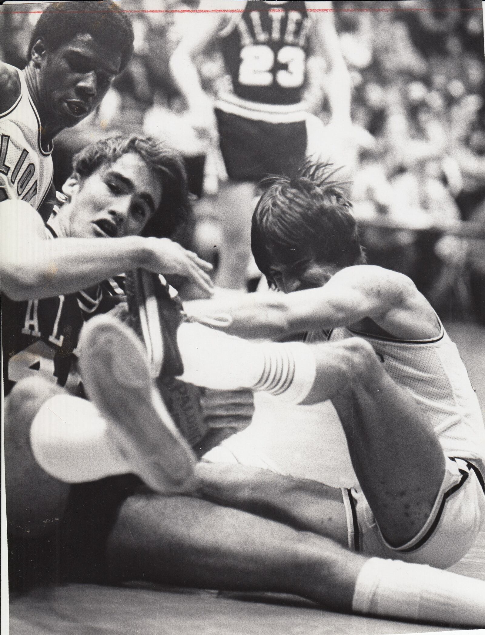 Alter’s Pete Boyle (left) fights for a loose ball. STAFF FILE