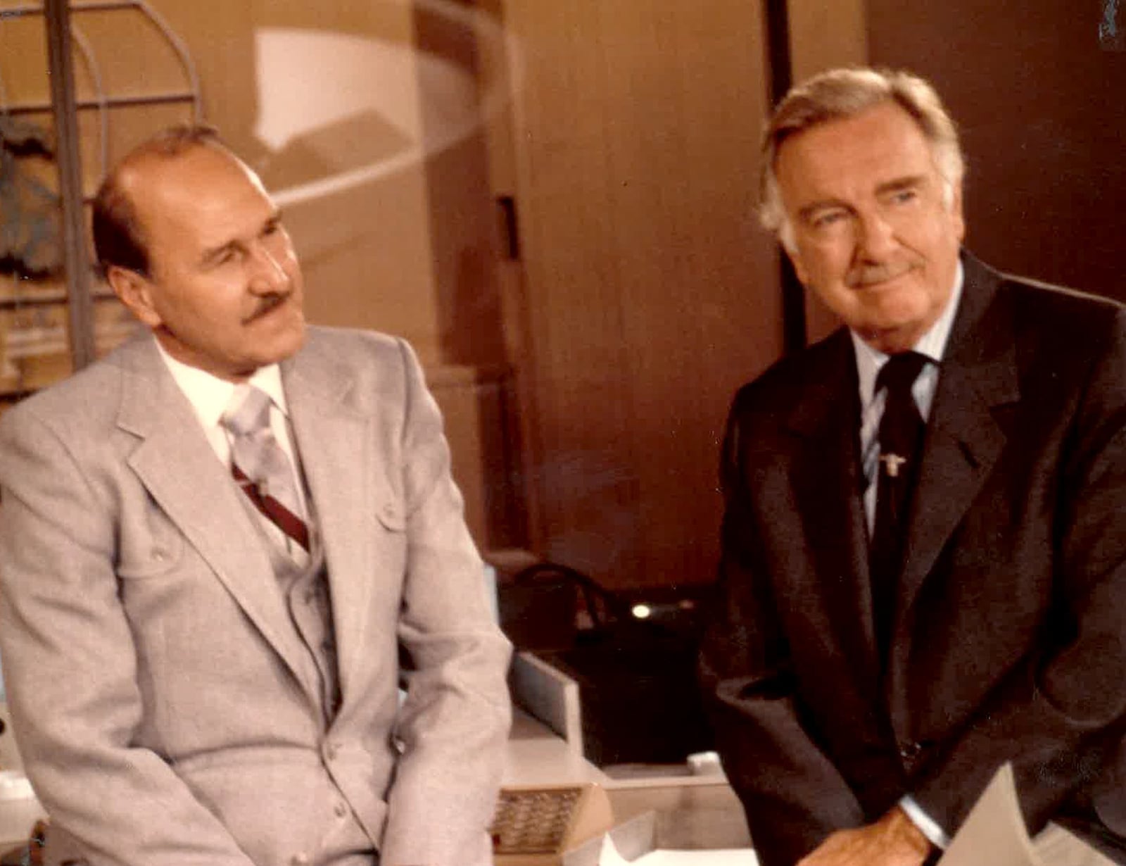 Don Wayne (left) was the first main news anchor for WHIO-TV. He is seated next to Walter Cronkite, the anchorman for the CBS Evening News. PHOTO: WHIO-TV