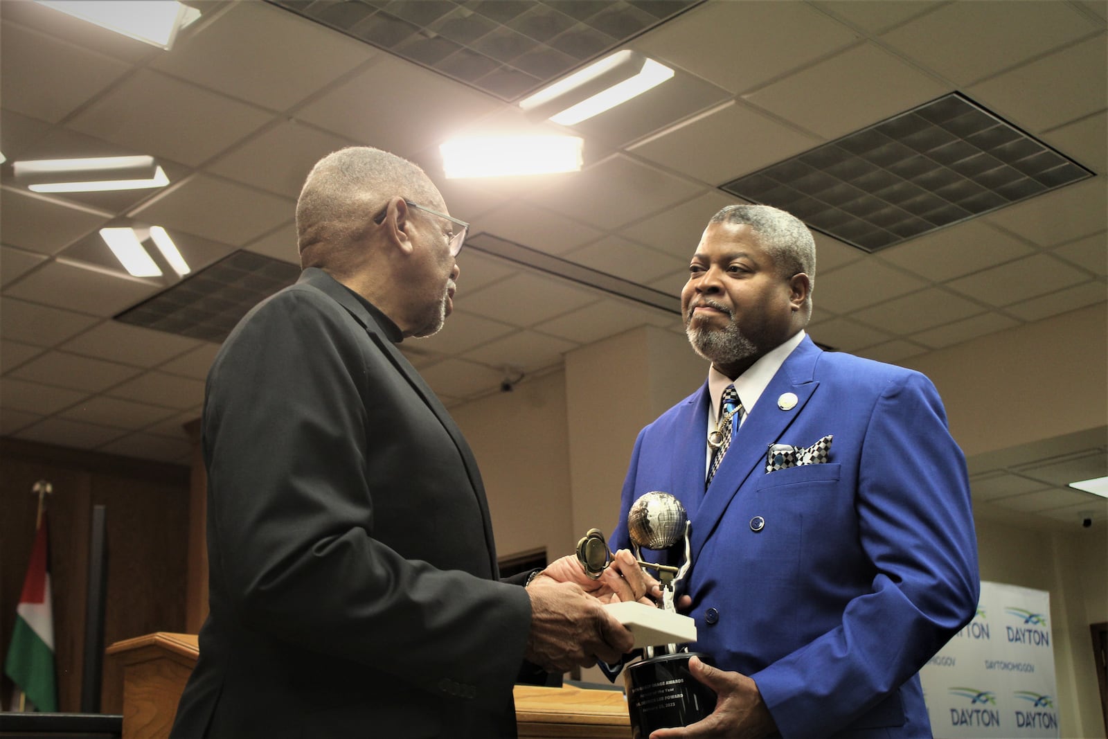 Dayton Mayor Jeffrey Mims Jr. presents a key to the city of Dayton to Derrick Foward, president of the Dayton unit NAACP, on May 3, 2023. CORNELIUS FROLIK / STAFF