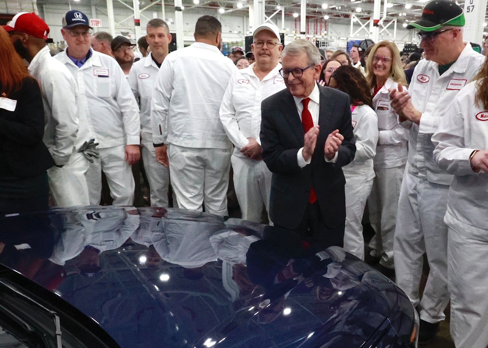 Ohio Governor Mike DeWine applauds the unveiling of the new 2023 Honda Accord during a ceremony at the Marysville plant Thursday, Jan. 5, 2023. BILL LACKEY