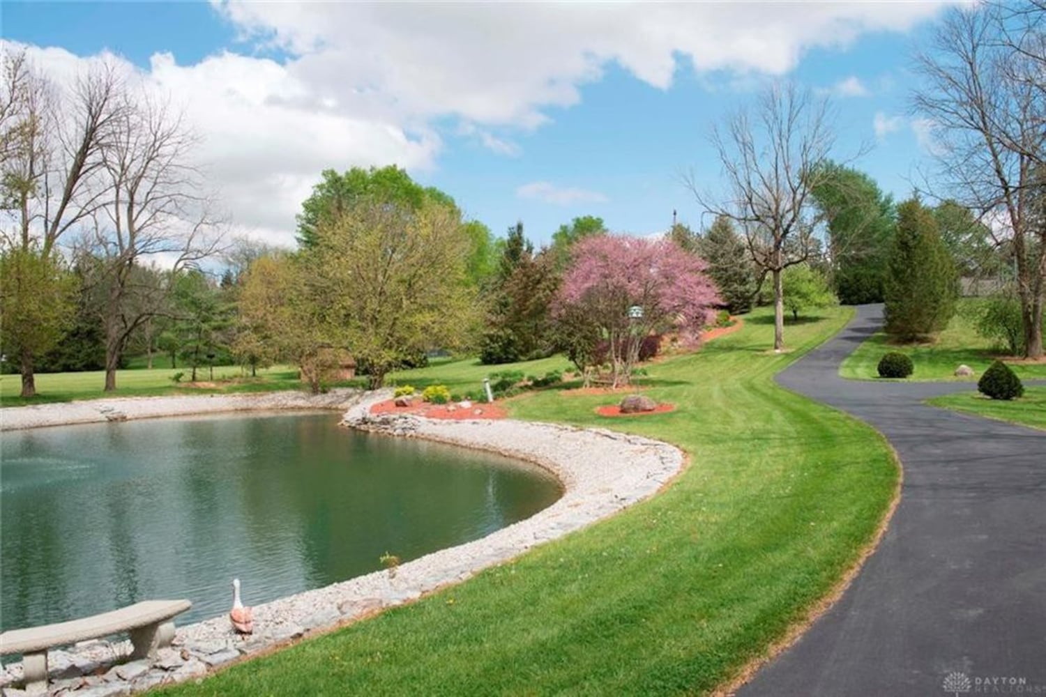 PHOTOS: Nearly 10-acre Miami County property listed has luxury home, stocked fishing pond