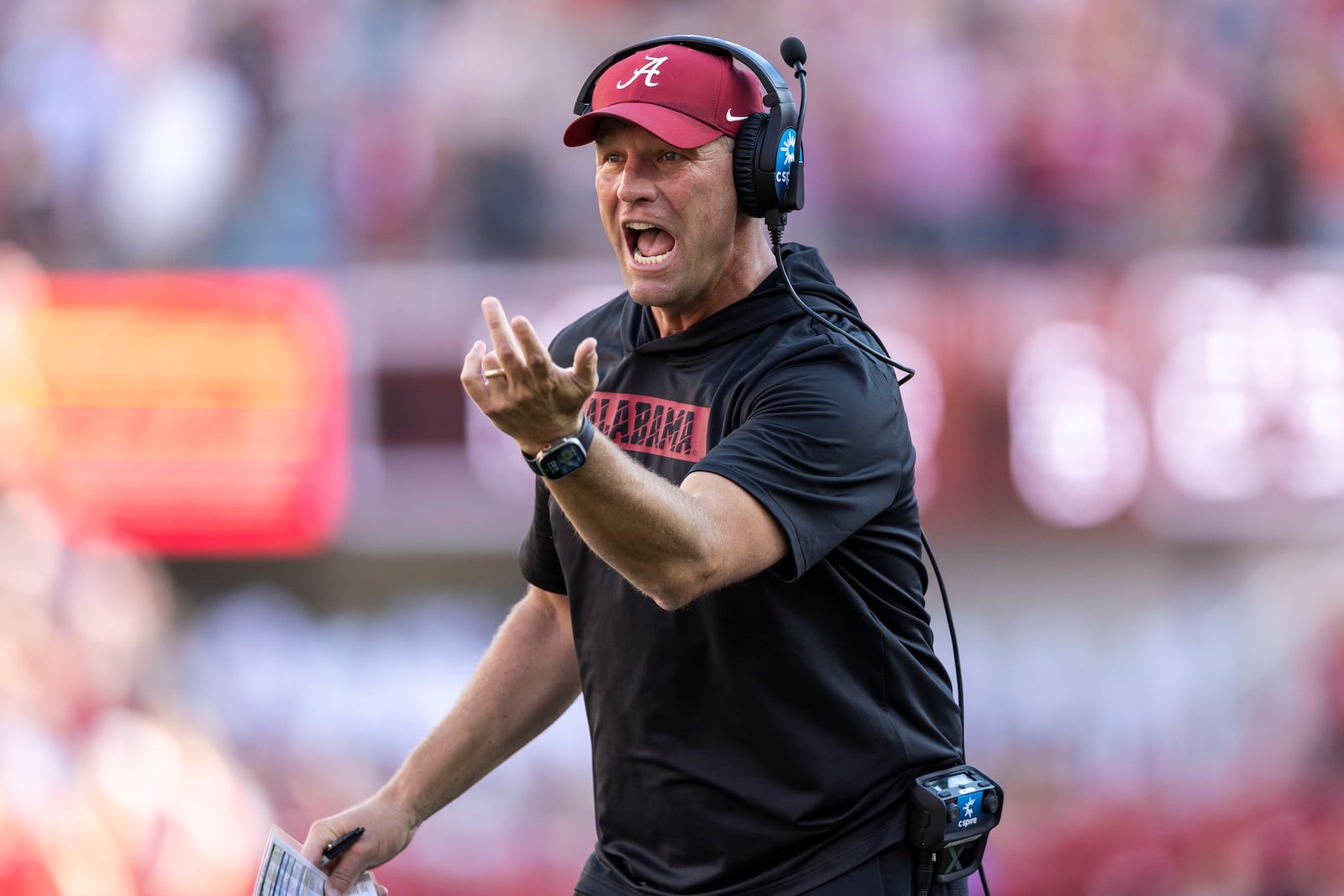 Alabama head coach Kalen DeBoer works with his players during the first half of an NCAA college football game against Missouri, Saturday, Oct. 26, 2024, in Tuscaloosa, Ala. (AP Photo/Vasha Hunt)