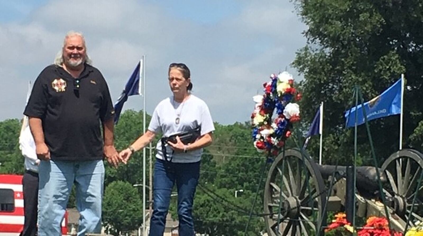 The parents of U.S. Army Pfc. James B. White Jr., a Huber Heights man killed in action in 2006, lay a wreath during the Memorial Day ceremonies at the Dayton National Cemetery Monday. NICK BLIZZARD