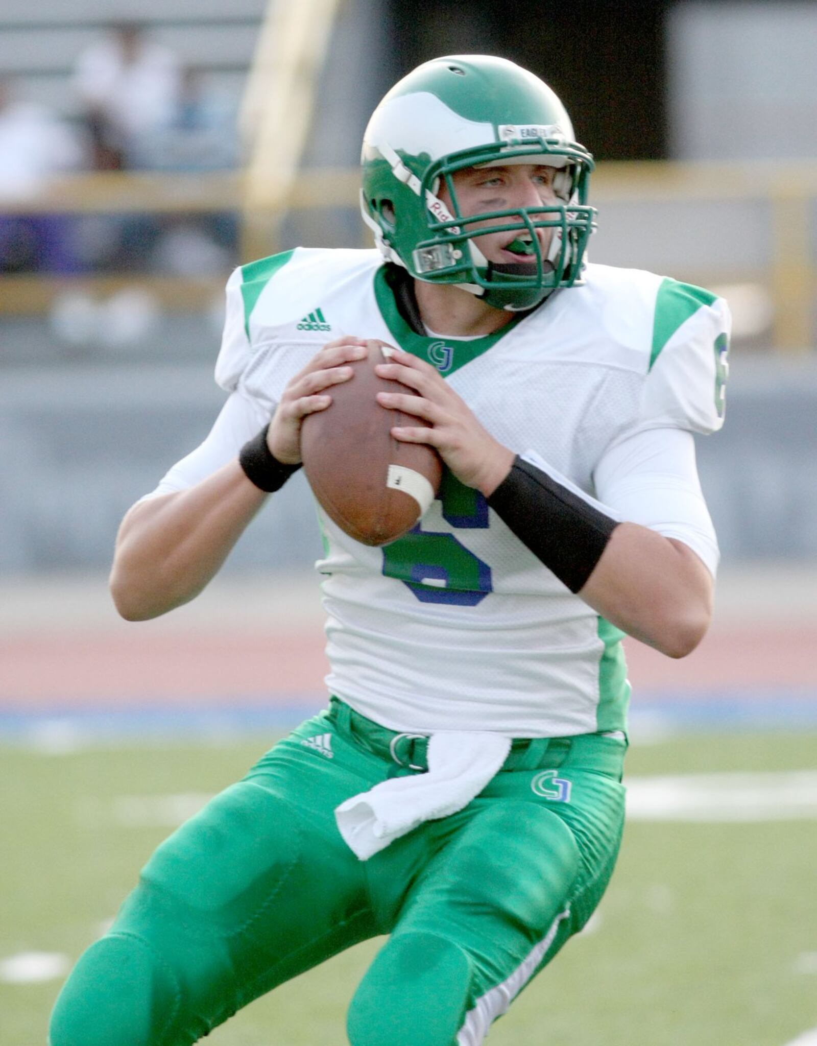 E.L. Hubbard for the Dayton Daily News Chaminade Julienne quarterback Kurt Hess looks for a receiver against Thurgood Marshall in the first half at Welcome Stadium Thursday, August 28, 2008.