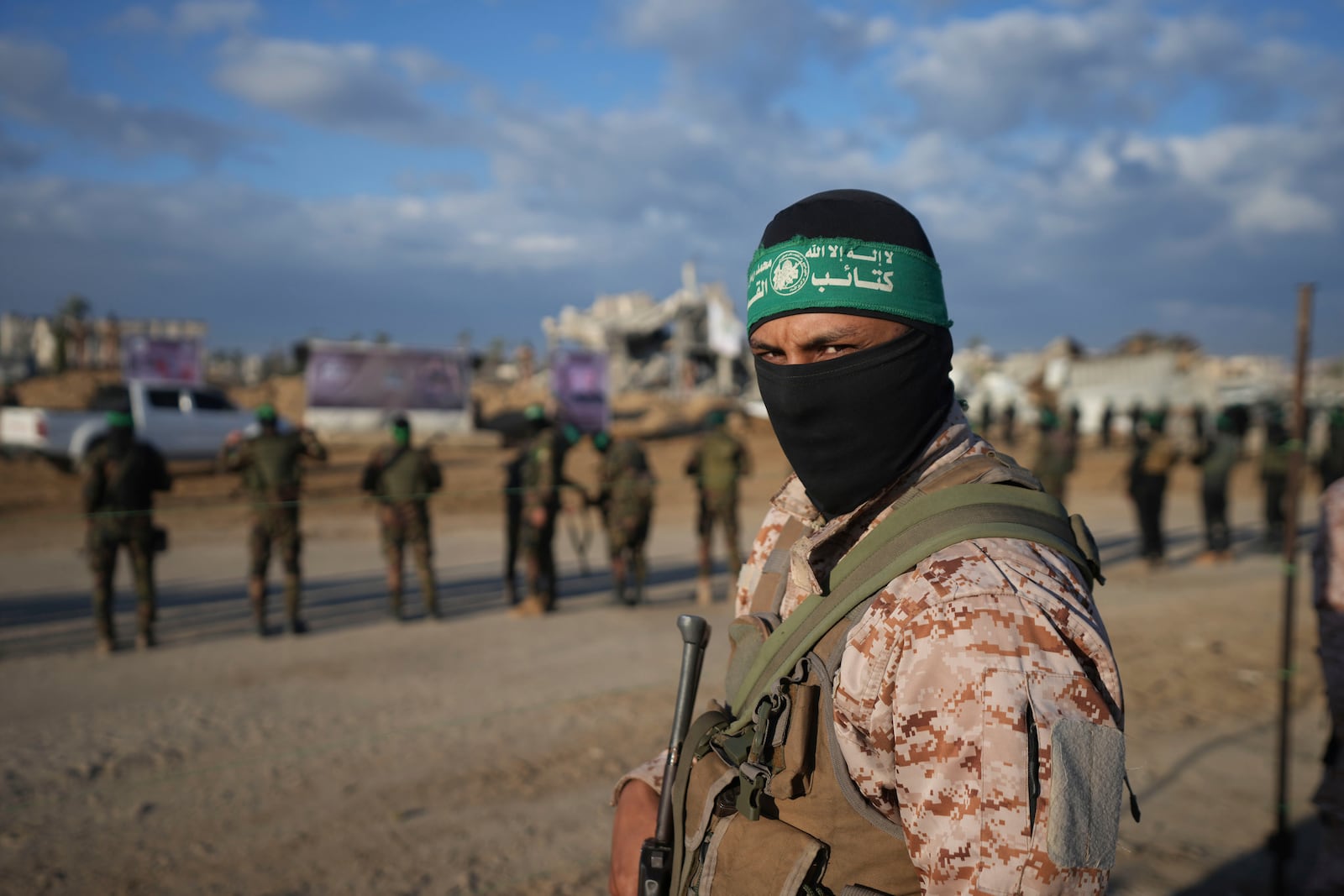 Hamas militants deploy and take up positions ahead of Israeli Ofer Kalderon's release, who has been held hostage by Hamas in Gaza since October 7, 2023, as he is being handed over to the Red Cross in Khan Younis, southern Gaza Strip, Saturday Feb. 1, 2025. Photo/Abdel Kareem)