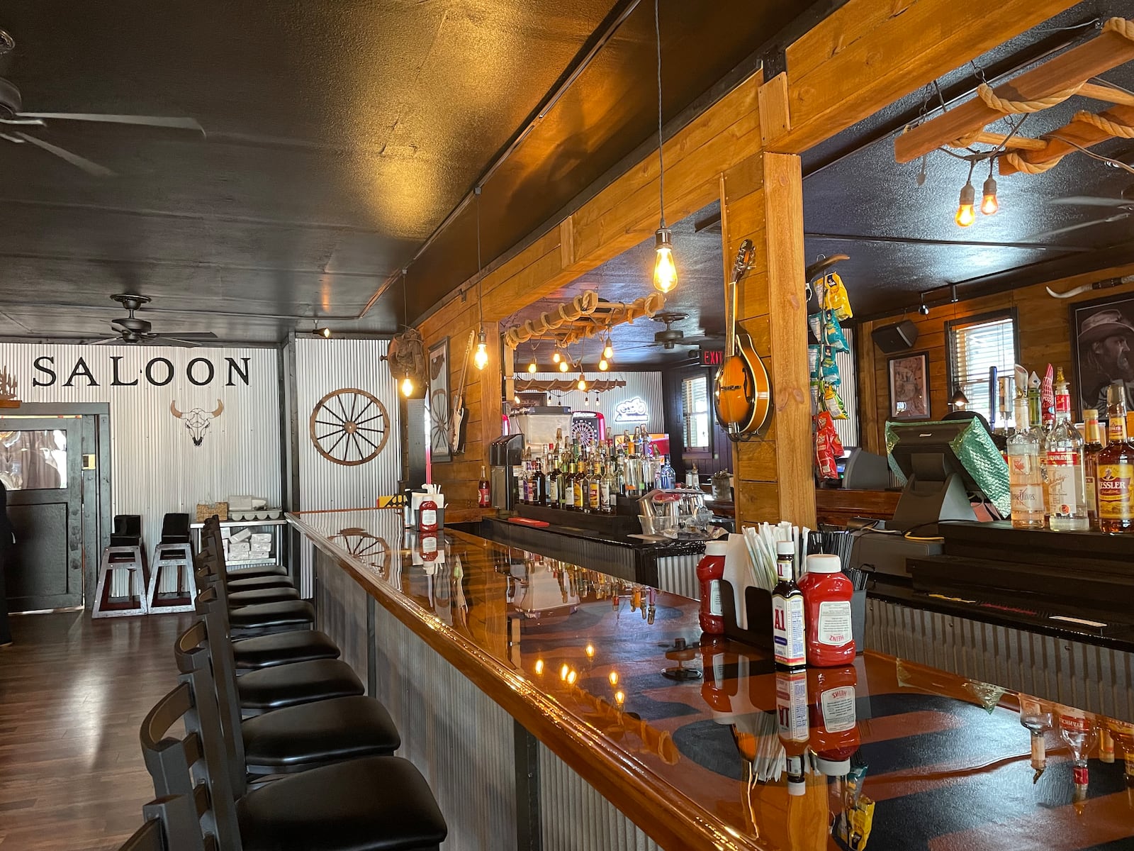 Lov’s Whiskey Barrel Saloon is opening its second location Friday, June 16 at 11 a.m. in the former space of Angie’s Firehouse Tavern in Dayton’s Belmont neighborhood. NATALIE JONES/STAFF