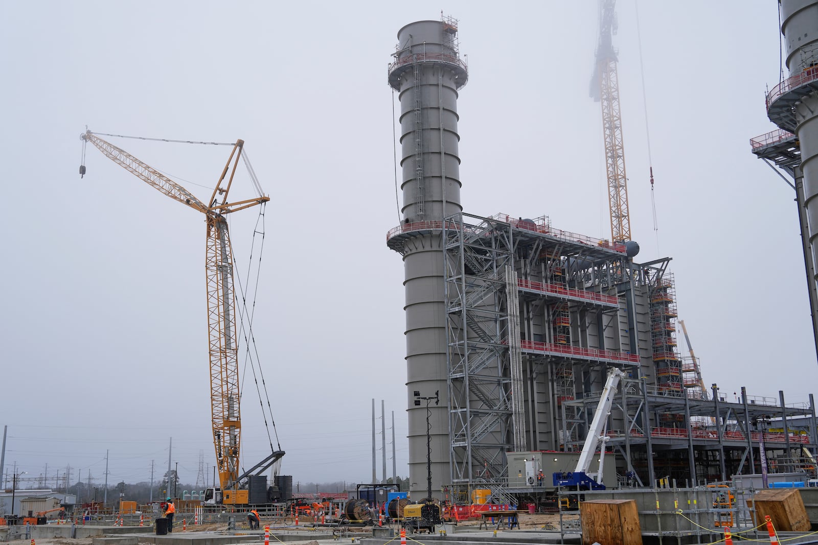 FILE - One of the heat recovery steam generators at Entergy's Orange County Advanced Power Station, a 1,215-megawatt facility under construction, is shown Monday, Feb. 24, 2025, in Orange, Texas. (AP Photo/David J. Phillip, File)