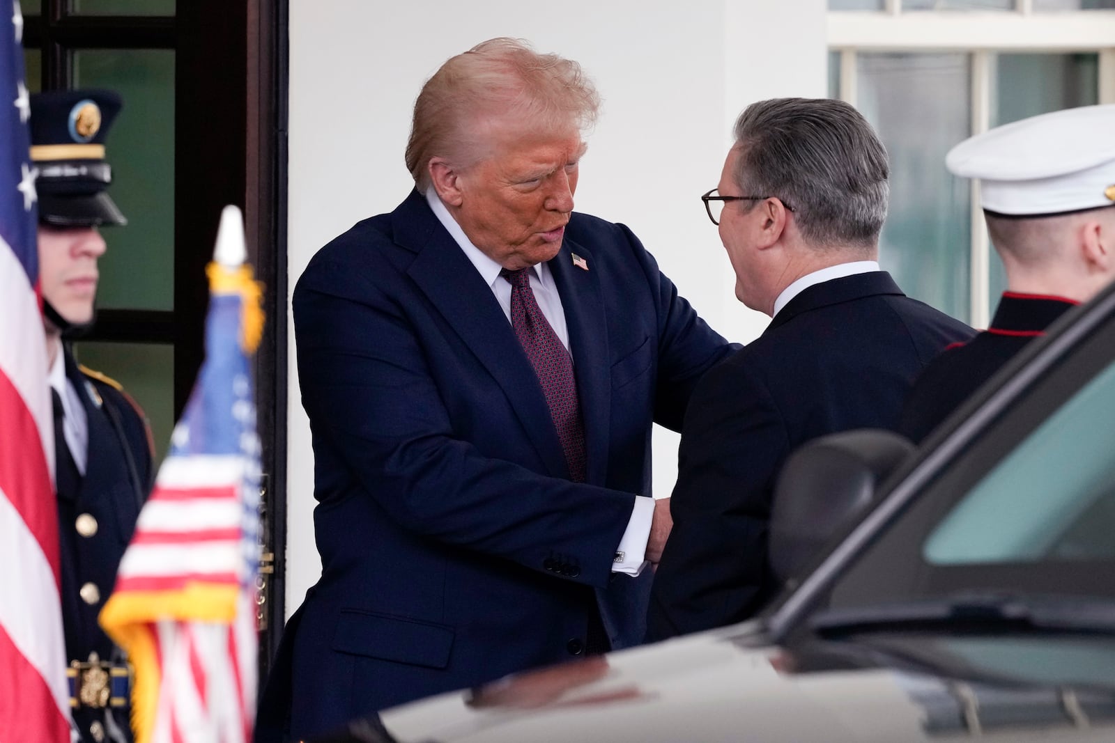 Britain's Prime Minister Keir Starmer is greeted by President Donald Trump as he arrives at the White House in Washington, Thursday, Feb. 27, 2025. (AP Photo/Ben Curtis)