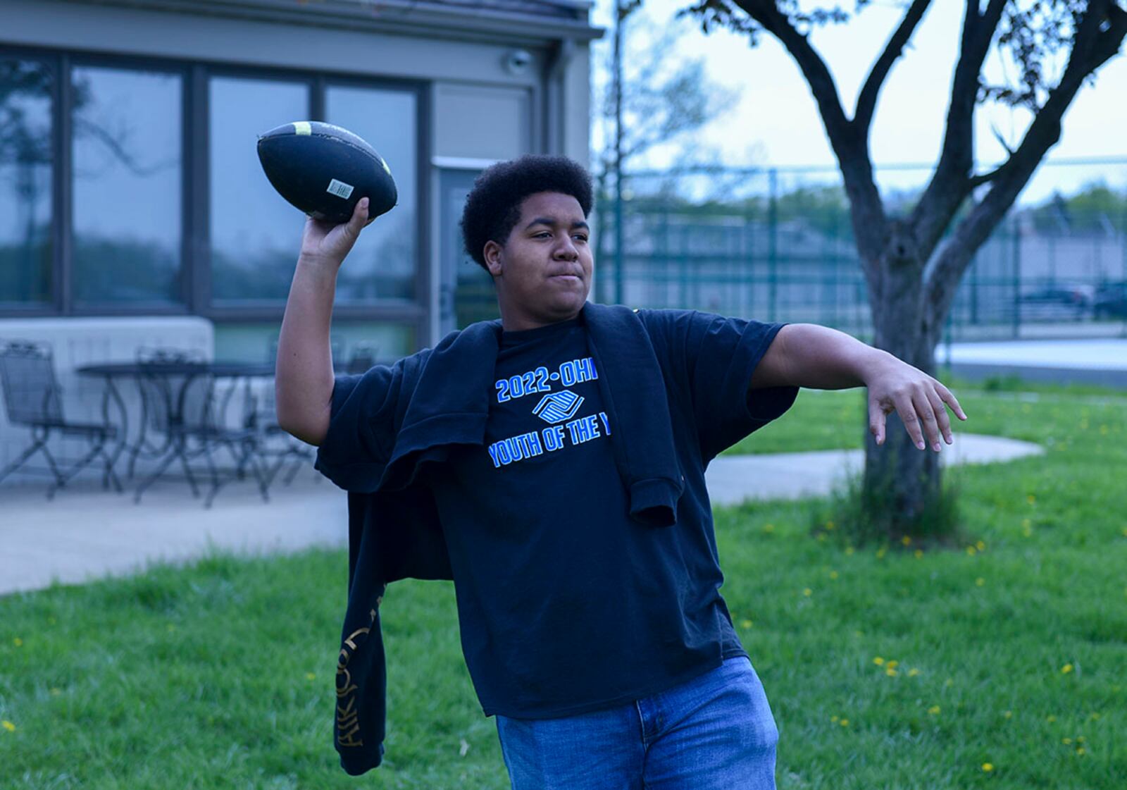 Jamari Jones throws a football at Prairies Youth Center on April 29 near Wright-Patterson Air Force Base. He is the 2022 Ohio Military Youth of the Year and will move on to compete at the regional level in Chicago. U.S. AIR FORCE PHOTO/SENIOR AIRMAN JACK GARDNER