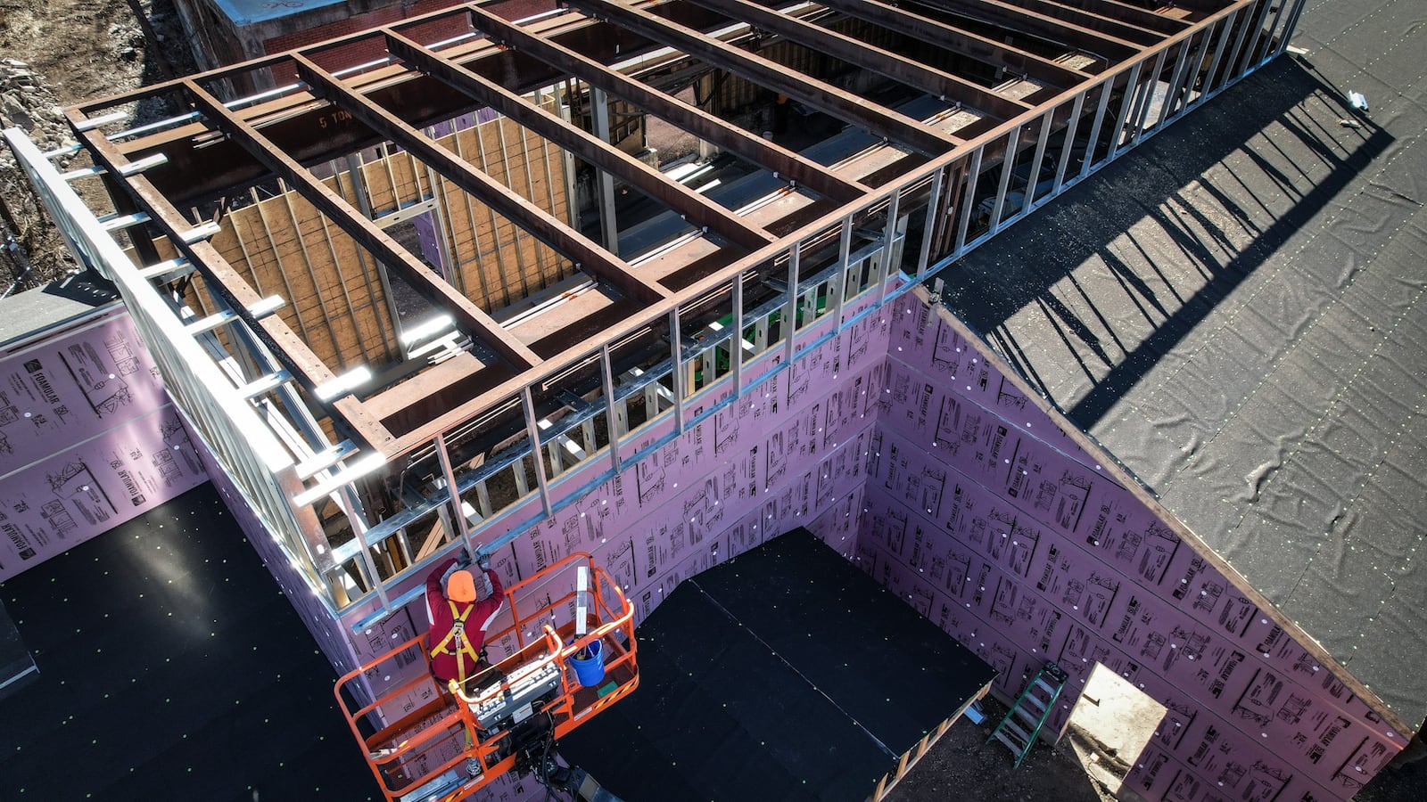 Wes Hartshorn and his two friends/business partners, Shannon Thomas and Scott Johnson, are in the midst of redeveloping 1.5 acres near 2nd Street Market in downtown Dayton into The Silos, a food hall and beer garden with 13,000-square-feet of outdoor space. JIM NOELKER/STAFF