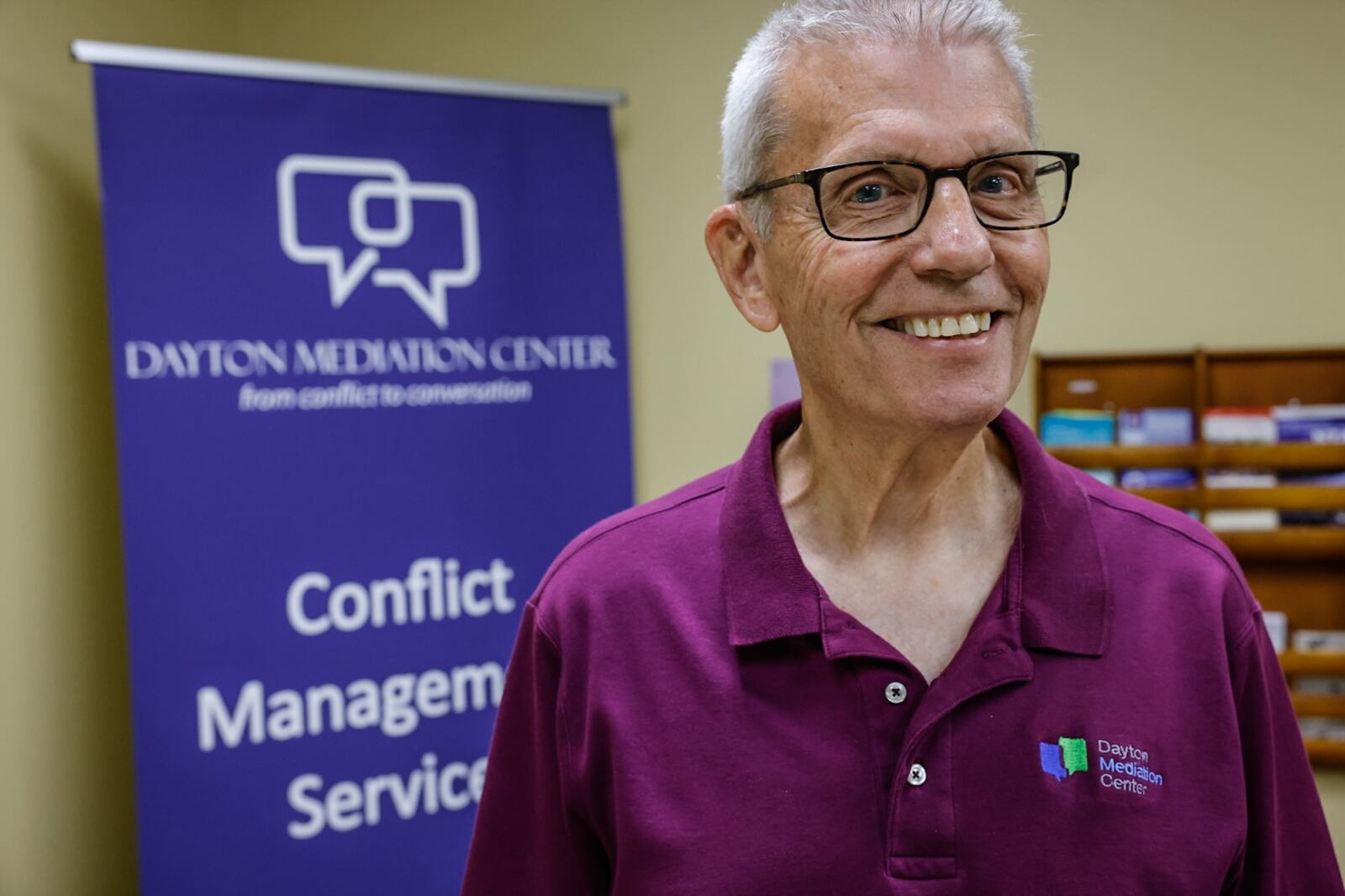 Community Gem Dick Todd is a volunteer mediator at the Dayton Mediation Center on West Second Street. JIM NOELKER/STAFF