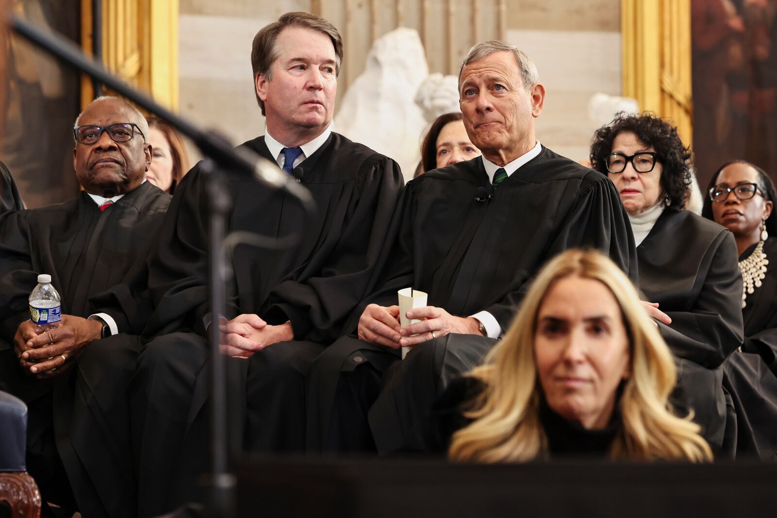 From left, Supreme Court Justice Clarence Thomas, Supreme Court Justice Brett Kavanaugh, Supreme Court Chief Justice John Roberts, Supreme Court Justice Sonia Sotomayor and Supreme Court Justice Ketanji Brown Jackson listen as President Donald Trump speaks during the 60th Presidential Inauguration in the Rotunda of the U.S. Capitol in Washington, Monday, Jan. 20, 2025. (Chip Somodevilla/Pool Photo via AP)