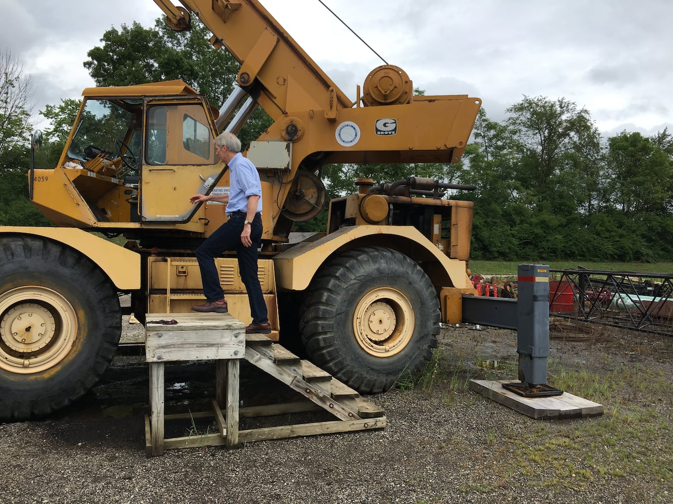 Rob Portman climbs into crane