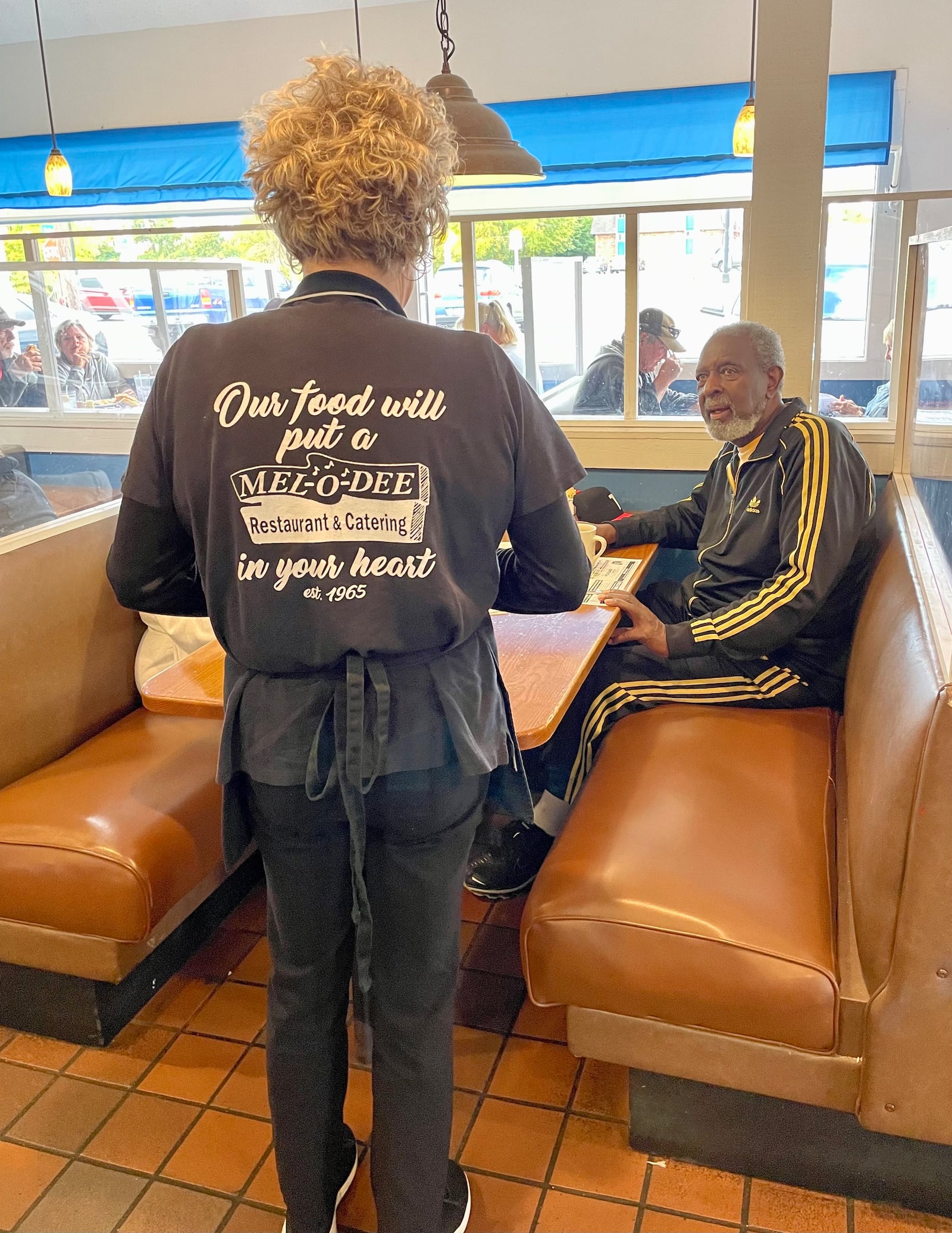 Longtime customer Joseph Washington of Trotwood enjoys the food and family atmosphere of the Mel-O-Dee Restaurant. PHOTO BY DEBBIE JUNIEWICZ