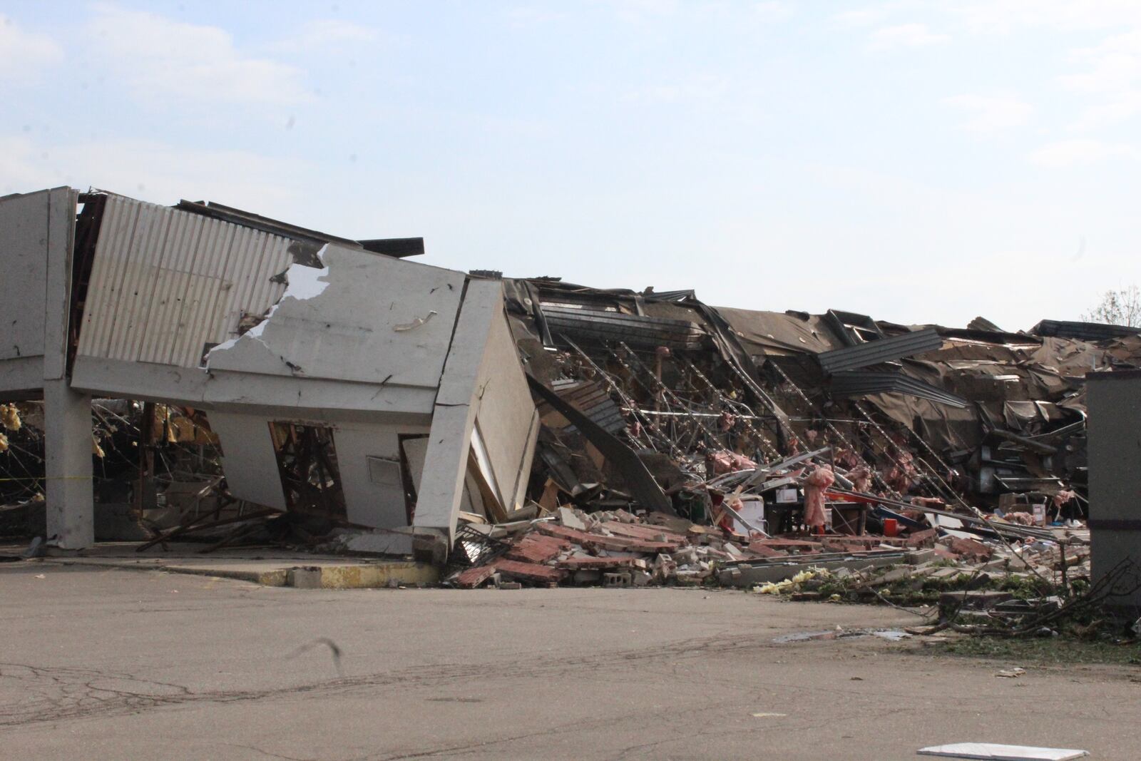 The Living Room strip club, Rite Aid and Family Dollar were among the North Dixie  Drive business damaged during a suspected tornado in Harrison Twp.