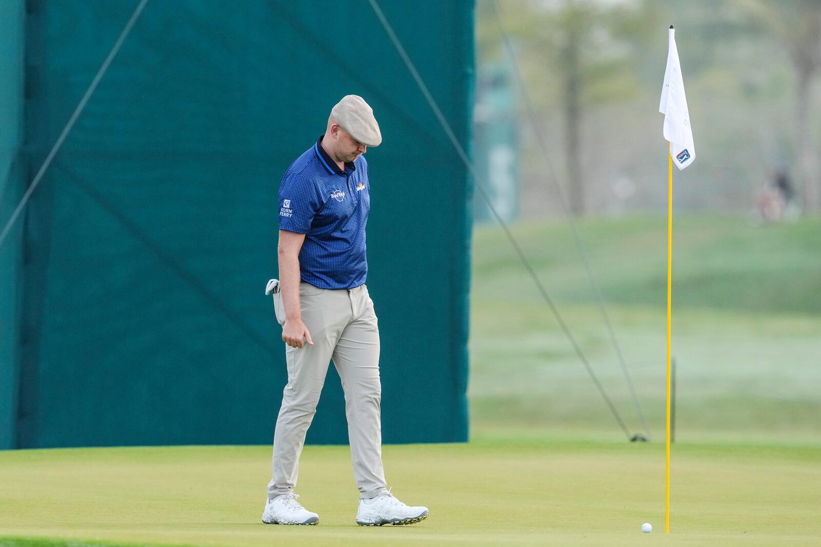 Harry Hall, of England, reacts after missing a putt on the 11th green during the first round of the Mexico Open golf tournament in Puerto Vallarta, Mexico, Thursday, Feb. 20, 2025. (AP Photo/Fernando Llano)