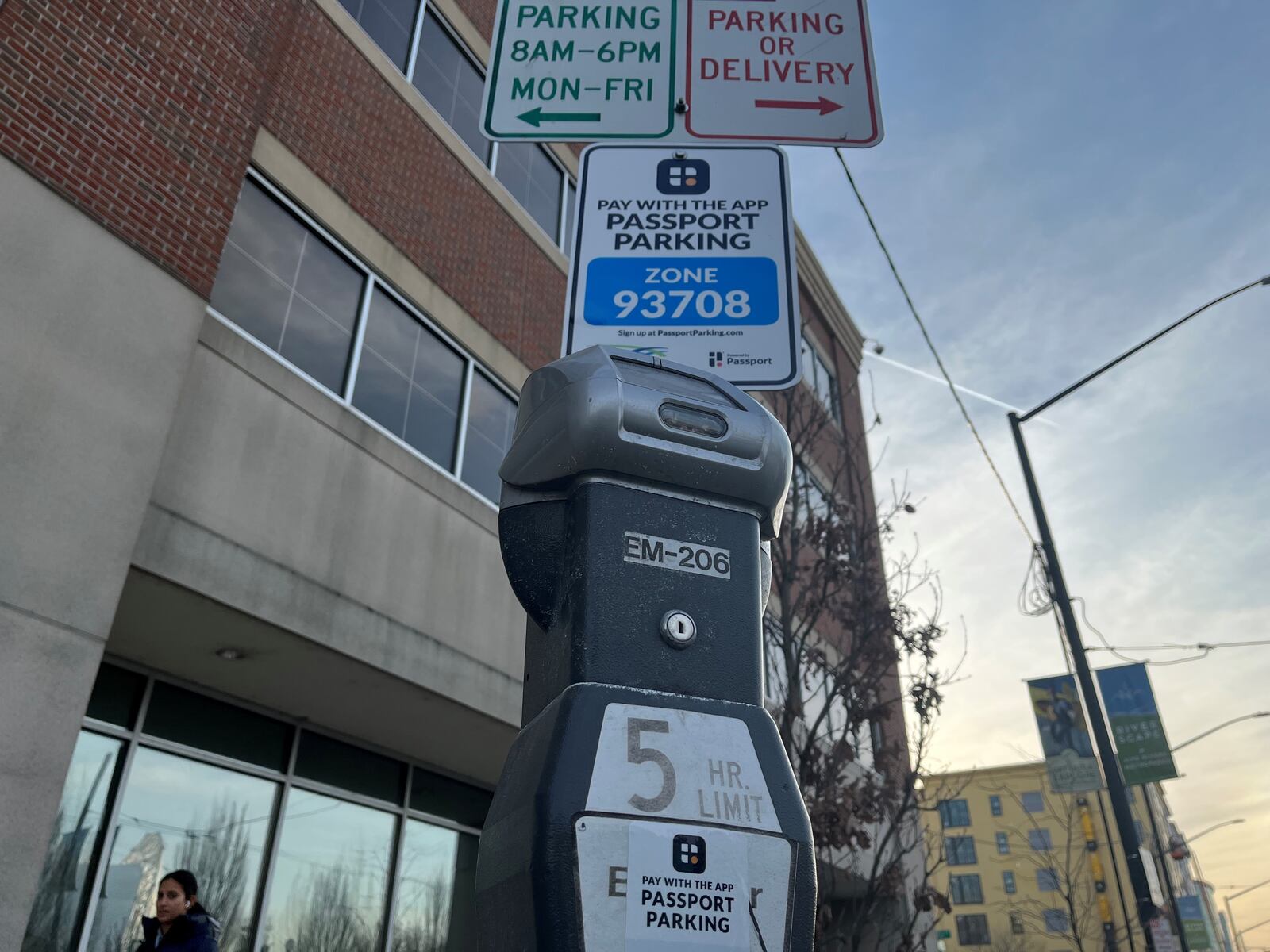 The city of Dayton has launched an app that lets drivers pay for parking on their phone instead of using a meter. CORNELIUS FROLIK / STAFF