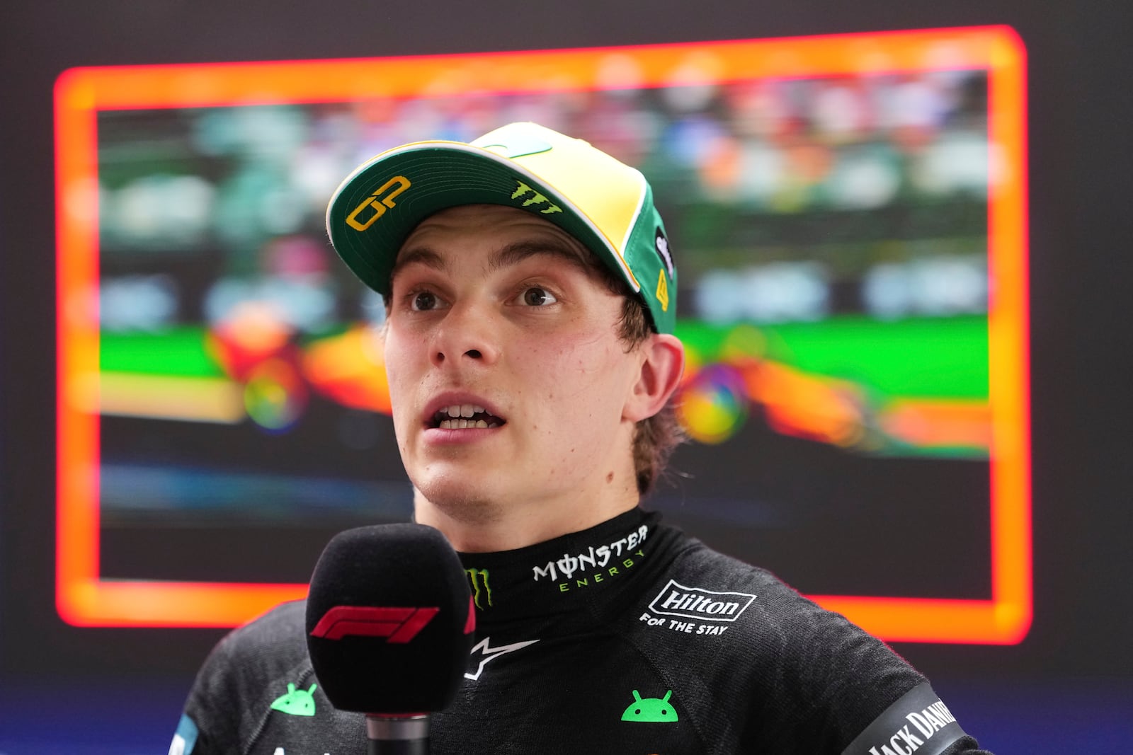 McLaren driver Oscar Piastri of Australia reacts as he is interviewed following his second place finish in qualifying at the Australian Formula One Grand Prix at Albert Park, in Melbourne, Australia, Saturday, March 15, 2025. (AP Photo/Scott Barbour)