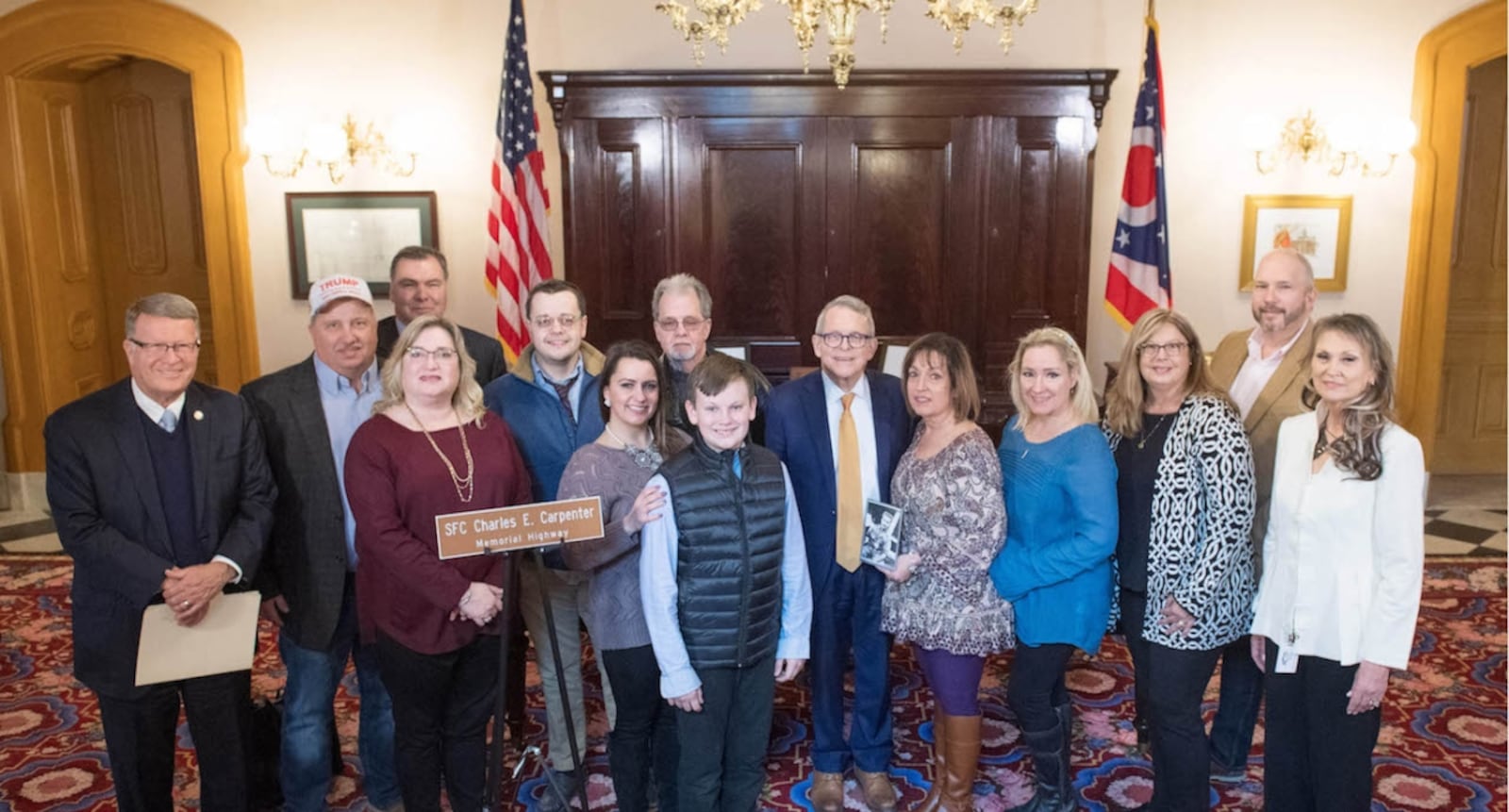 The family of SFC Charles Carpenter with Governor Mike DeWine and Senator Steve Wilson