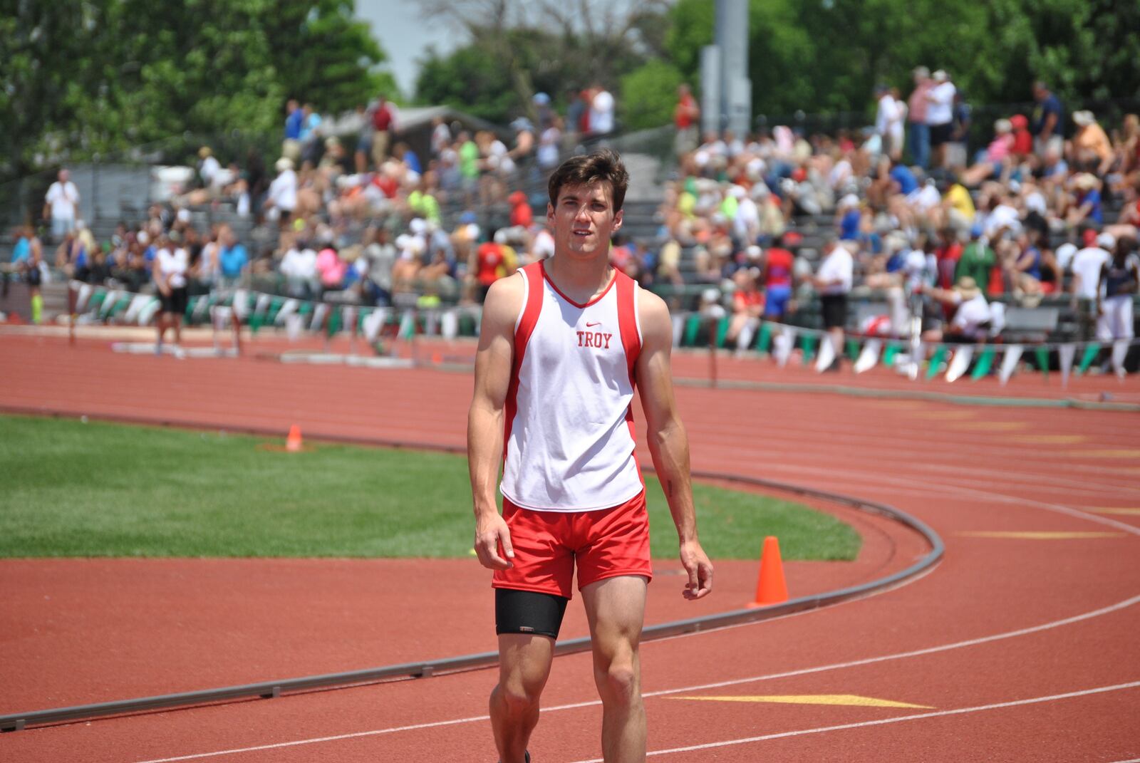 Nathan Fleischer, who has written two children's books, was an athlete at Troy High School and ran track. He is shown in 2014 at a track meet. CONTRIBUTED