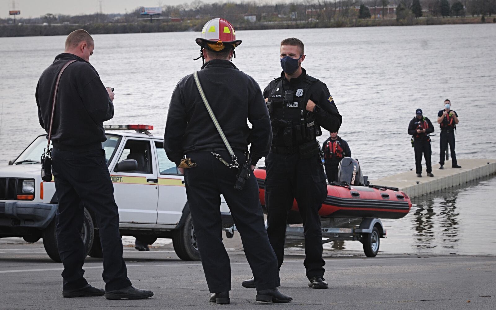 Man, dog rescued after boat overturns