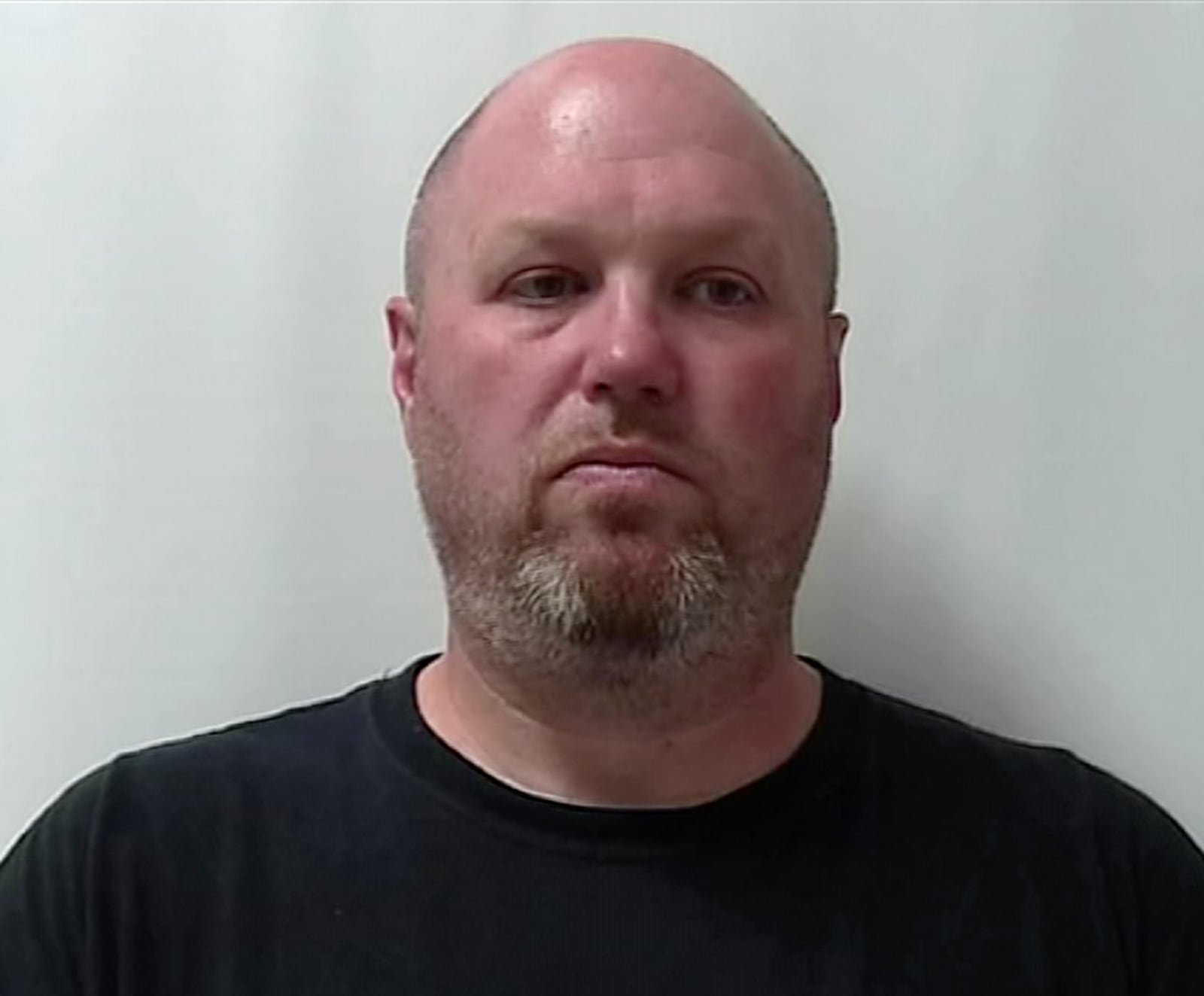 Eric Smith, police chief in the Champaign County village of St. Paris, was arrested at the county fair Aug. 4, 2024 on counts of obstructing official business and criminal trespass related to his unwillingness to put away his gun.