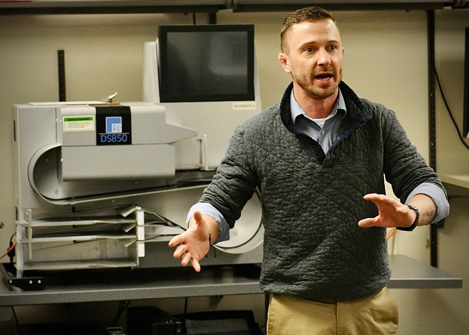 Guy Aber, internal services administrator for the Montgomery County Board of Elections, explains the BOE's tabulation process during a media open house Wednesday March 23, 2022. MARSHALL GORBY\STAFF