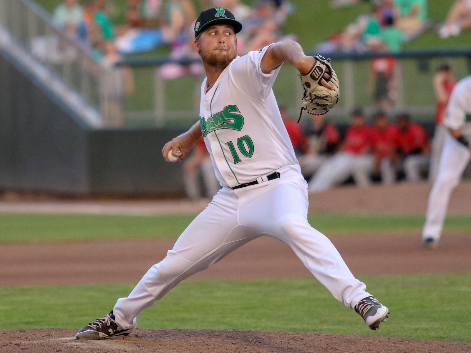 Dayton Dragons pitcher Clate Schmidt motions to the plate during their game against the Wisconsin Timber Rattlers on Thursday night at Fifth Third Field. Schmidt threw three scoreless innings, striking out five batters, but the Timber Rattlers won 1-0. CONTRIBUTED PHOTO BY MICHAEL COOPER