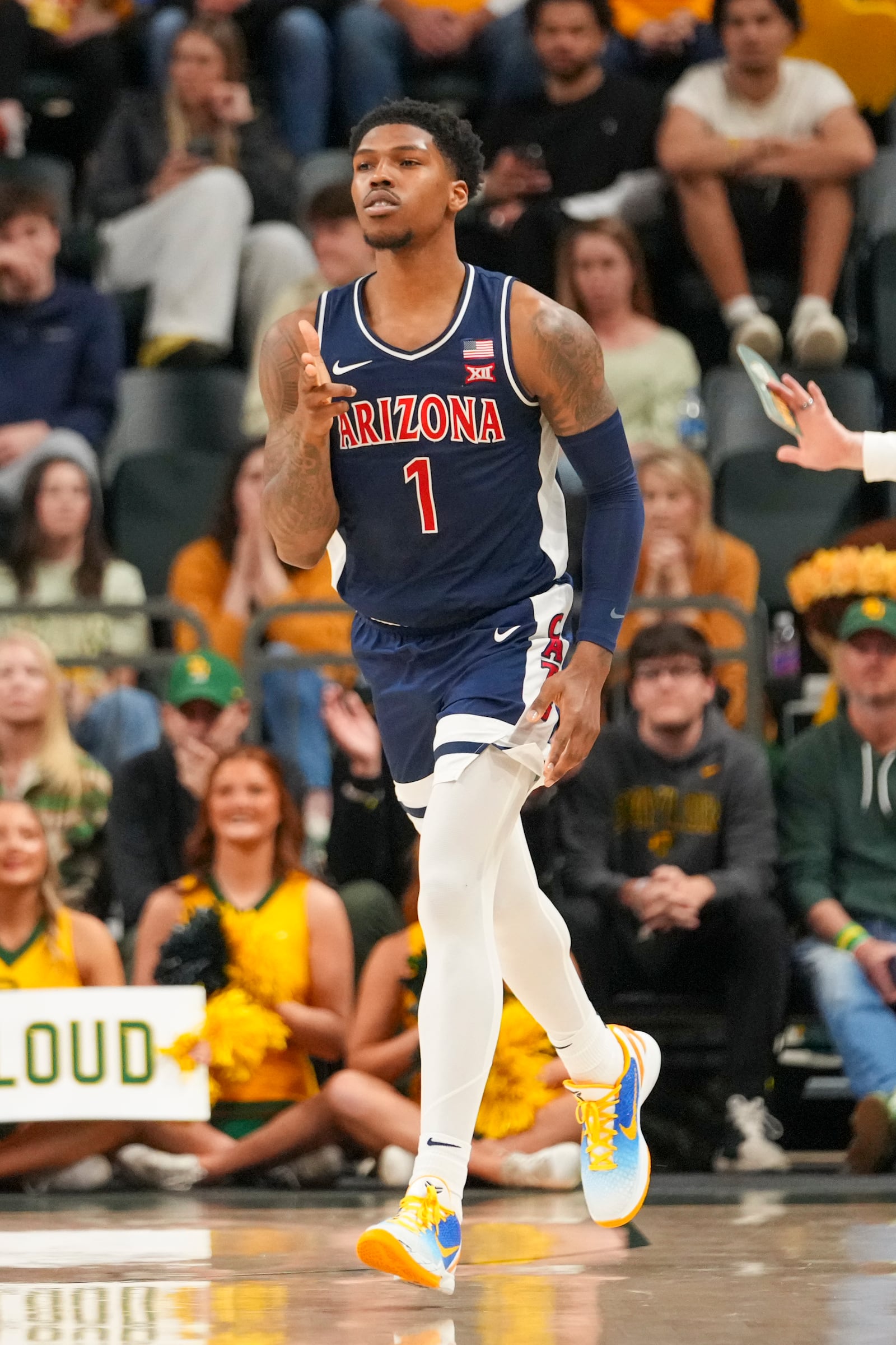 Arizona guard Caleb Love (1) reacts after scoring a basket against Baylor during the first half of an NCAA college basketball game Monday, Feb. 17, 2025, in Waco, Texas. (AP Photo/Julio Cortez)