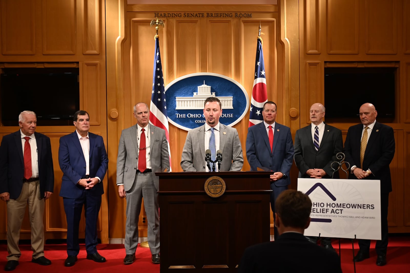 Ohio Rep. Thomas Hall announced the new Ohio Homeowners Relief Act at the statehouse on Wednesday. Pictured here are Rep. Bill Dean, Sen. George Lang, Rep. Adam Bird, Hall, Rep. Rodney Creech, Rep. Bill Roemer (chair of House Ways and Means Committee), and Rep. Tom Young