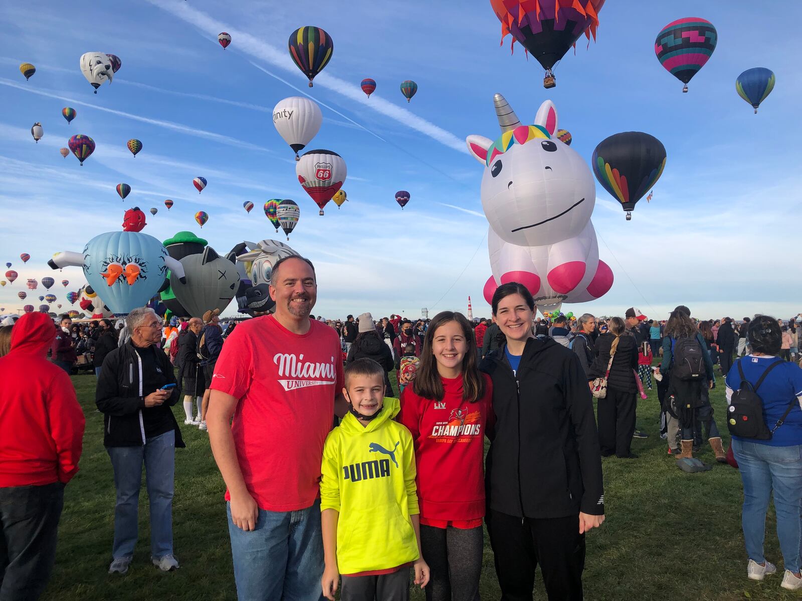 Tim Cary, a 2004 Cedarville University graduate and former Springfield resident, will appear on the Wheel of Fortune Thursday, Dec. 22. Pictured is Cary with his wife, Molly, and children Josh and Janna (CONTRIBUTED PHOTO).