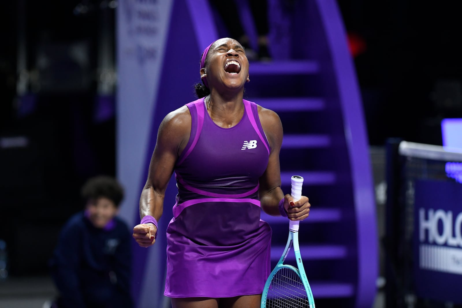 Coco Gauff of the U.S. reacts after winning against China's Qinwen Zheng in their women's singles final match of the WTA finals at the King Saud University Indoor Arena, in Riyadh, Saudi Arabia, Saturday, Nov. 9, 2024. (AP Photo)