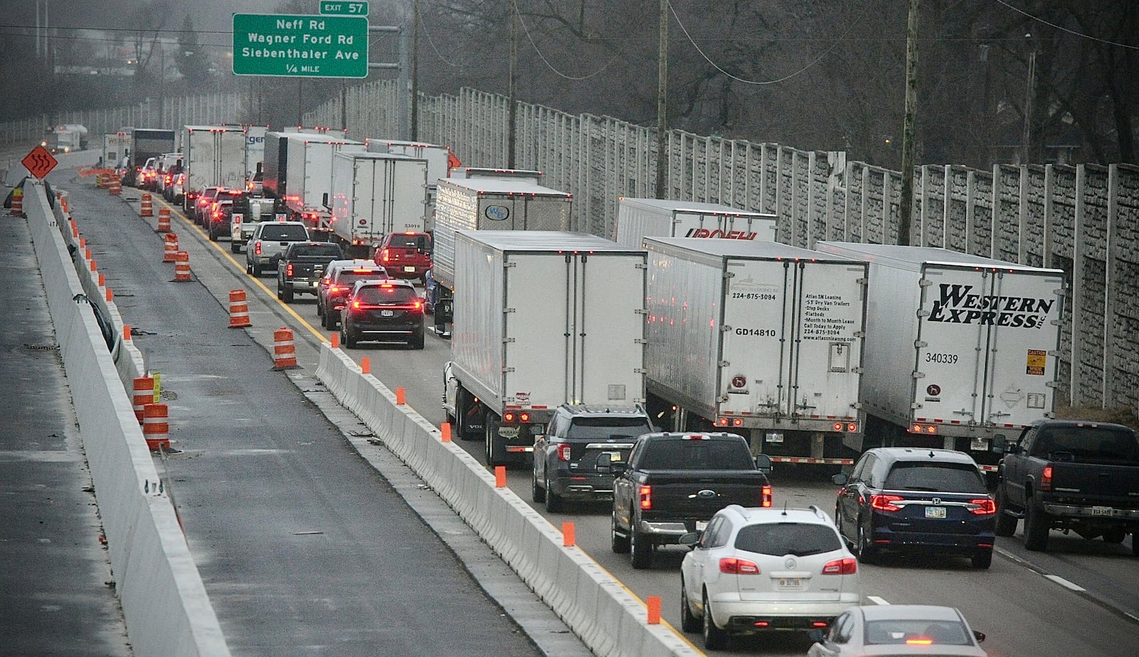 Traffic was backed up on Interstate 75 South in Dayton on Friday, Jan. 26, 2024, after the highway was closed near Stanley Avenue for pothole repairs. MARSHALL GORBY \STAFF