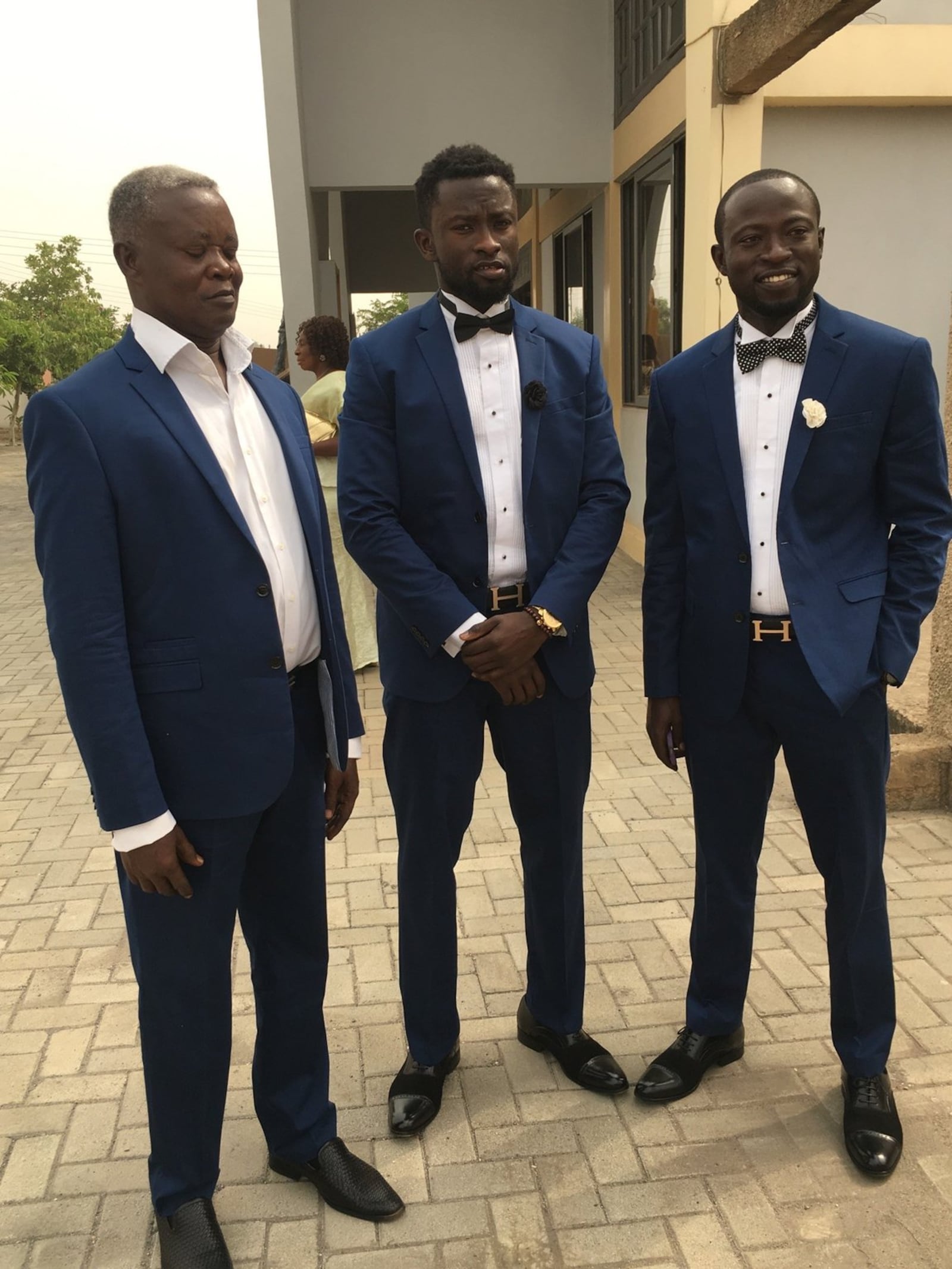 Former University of Dayton soccer player Isaac Kissi (center) with his late father Samuel (left) and older brother Stephen. CONTRIBUTED