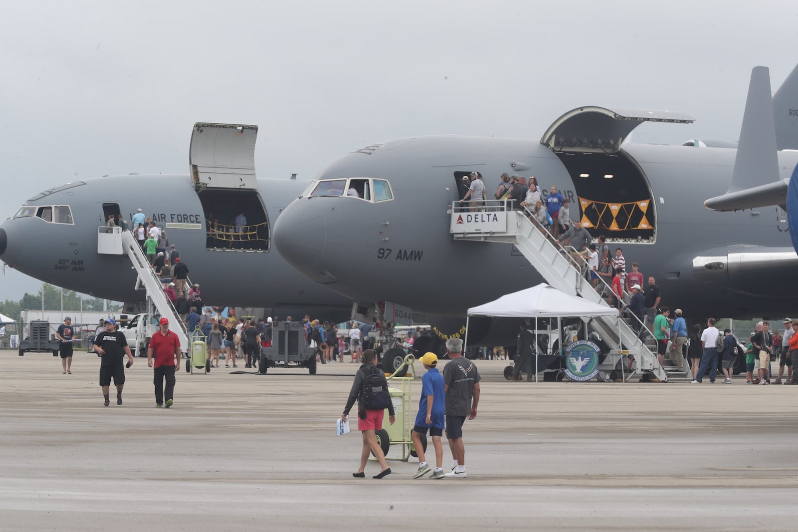 Visitors to the 2021 CenterPoint Dayton Air Show enjoy the static displays and tours of the airplanes on display. BILL LACKEY/STAFF