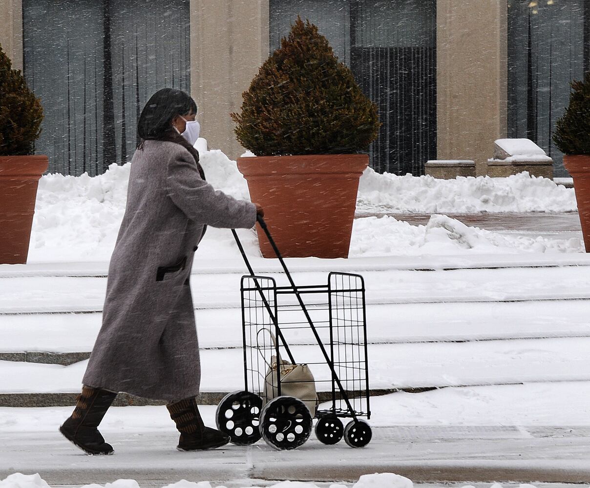 PHOTOS: Snow returns; brutally cold temperature ahead