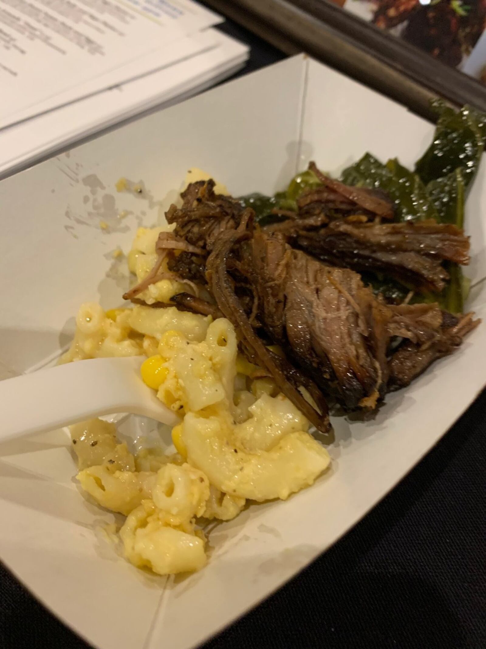 Calypso Grill and Smokehouse served a local beef brisket from South Charleston rubbed and marinated in jerk sauce, on a bed of local organic collard greens, accompanied by creamy mac n cheese made with fresh sweet corn and fire roasted bell peppers at the Miami Valley Restaurant Association’s Sneak Peek to Winter Restaurant Week. CONTRIBUTED/ALEXIS LARSEN